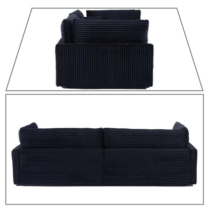 Divano classico ed elegante a tre posti rivestito in velluto a coste con due cuscini decorativi