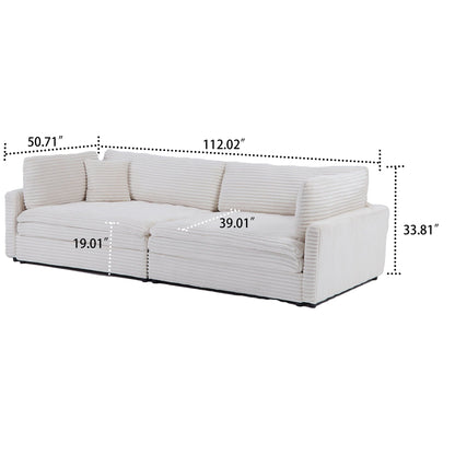 Divano classico ed elegante a tre posti rivestito in velluto a coste con due cuscini decorativi