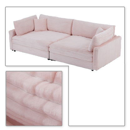 Divano classico ed elegante a tre posti rivestito in velluto a coste con due cuscini decorativi