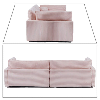 Divano classico ed elegante a tre posti rivestito in velluto a coste con due cuscini decorativi