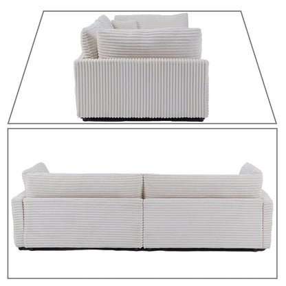 Divano classico ed elegante a tre posti rivestito in velluto a coste con due cuscini decorativi