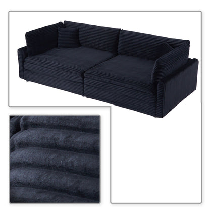 Divano classico ed elegante a tre posti rivestito in velluto a coste con due cuscini decorativi