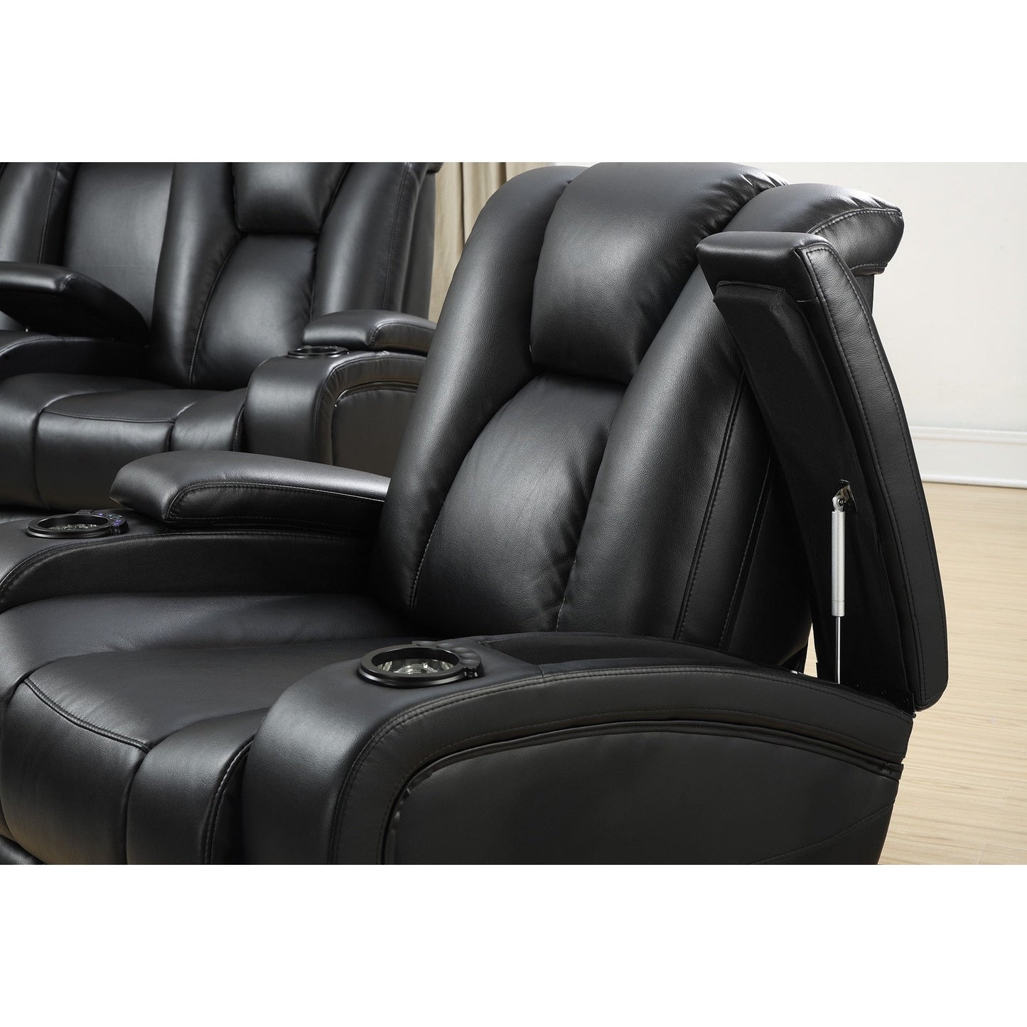 Divano elettrico Delange in similpelle nera con poggiatesta