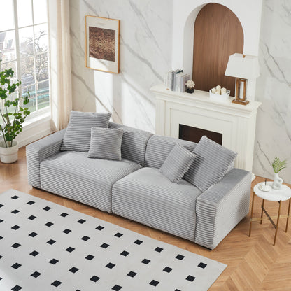 Divano a 4 posti in velluto a coste con cuscini decorativi