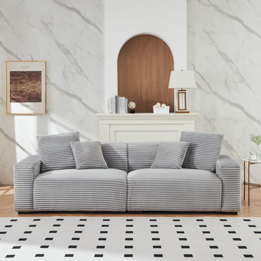 Divano a 4 posti in velluto a coste con cuscini decorativi