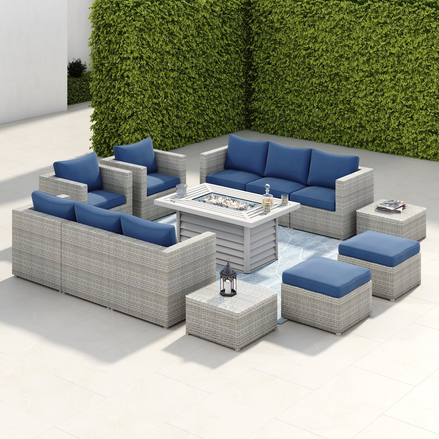 Set di mobili da giardino componibili in vimini intrecciato Corvus Trey da 13 pezzi con tavolo da fuoco