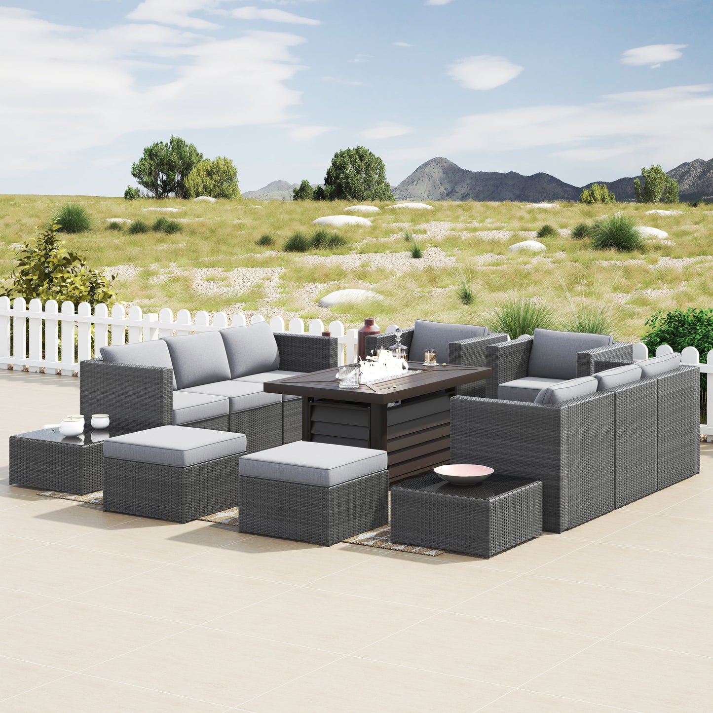 Set di mobili da giardino componibili in vimini intrecciato Corvus Trey da 13 pezzi con tavolo da fuoco