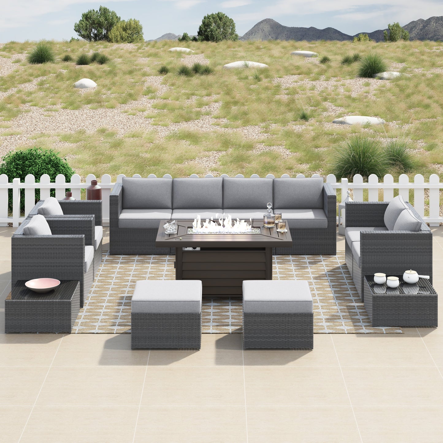 Set di mobili da giardino componibili in vimini intrecciato Corvus Trey da 13 pezzi con tavolo da fuoco