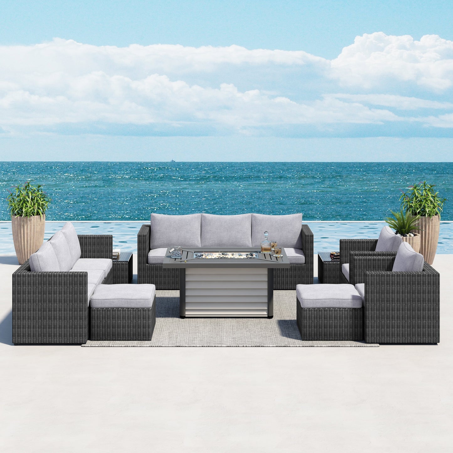 Set di mobili da giardino componibili in vimini intrecciato Corvus Trey da 13 pezzi con tavolo da fuoco