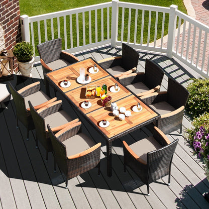 Set da pranzo in rattan per patio Costway 9 pezzi, 8 sedie impilabili imbottite - Set da 9 pezzi