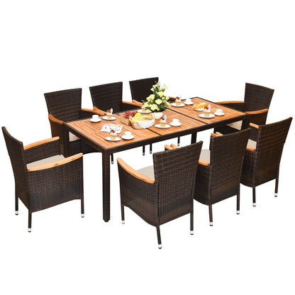 Set da pranzo in rattan per patio Costway 9 pezzi, 8 sedie impilabili imbottite - Set da 9 pezzi