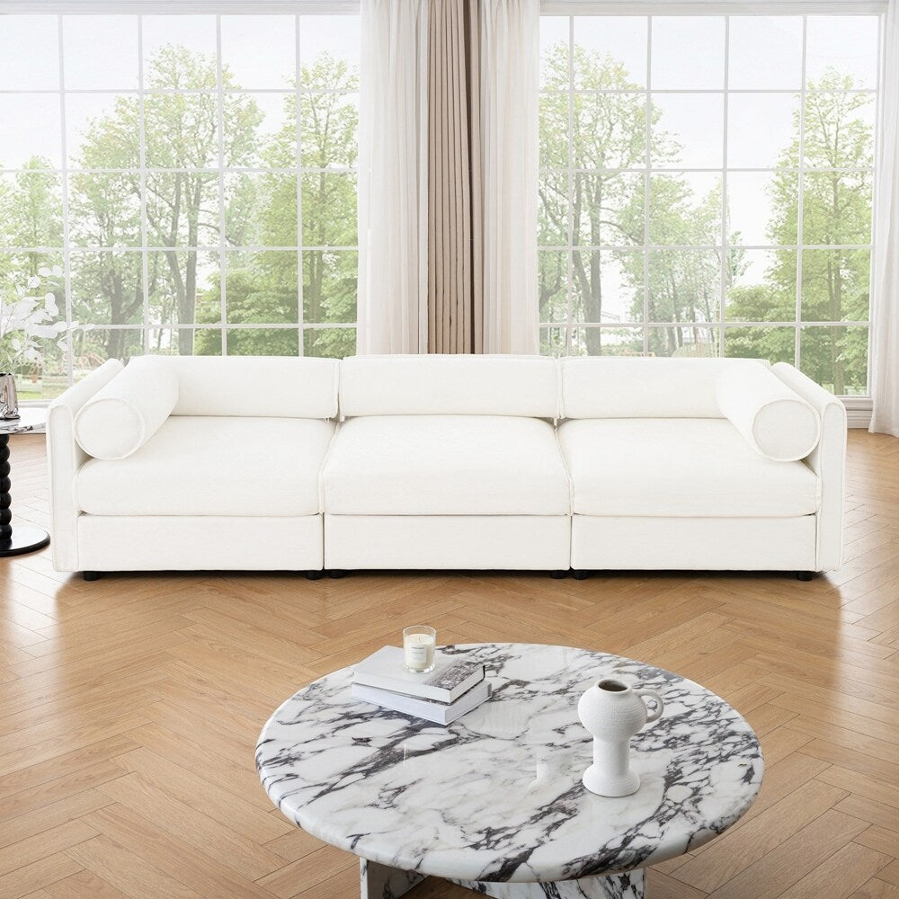 Divano in ciniglia con schienale e braccioli cilindrici e seduta contenitore