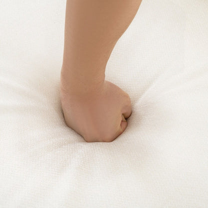 Divano in ciniglia con schienale e braccioli cilindrici e seduta contenitore