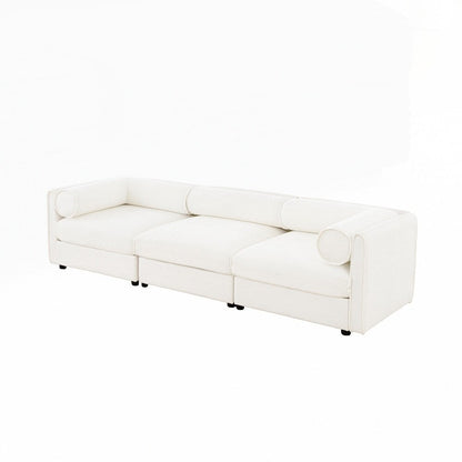 Divano in ciniglia con schienale e braccioli cilindrici e seduta contenitore