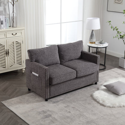 Divano a due posti moderno grigio scuro 52.36 imbottito in ciniglia con tasca e borchie per soggiorno