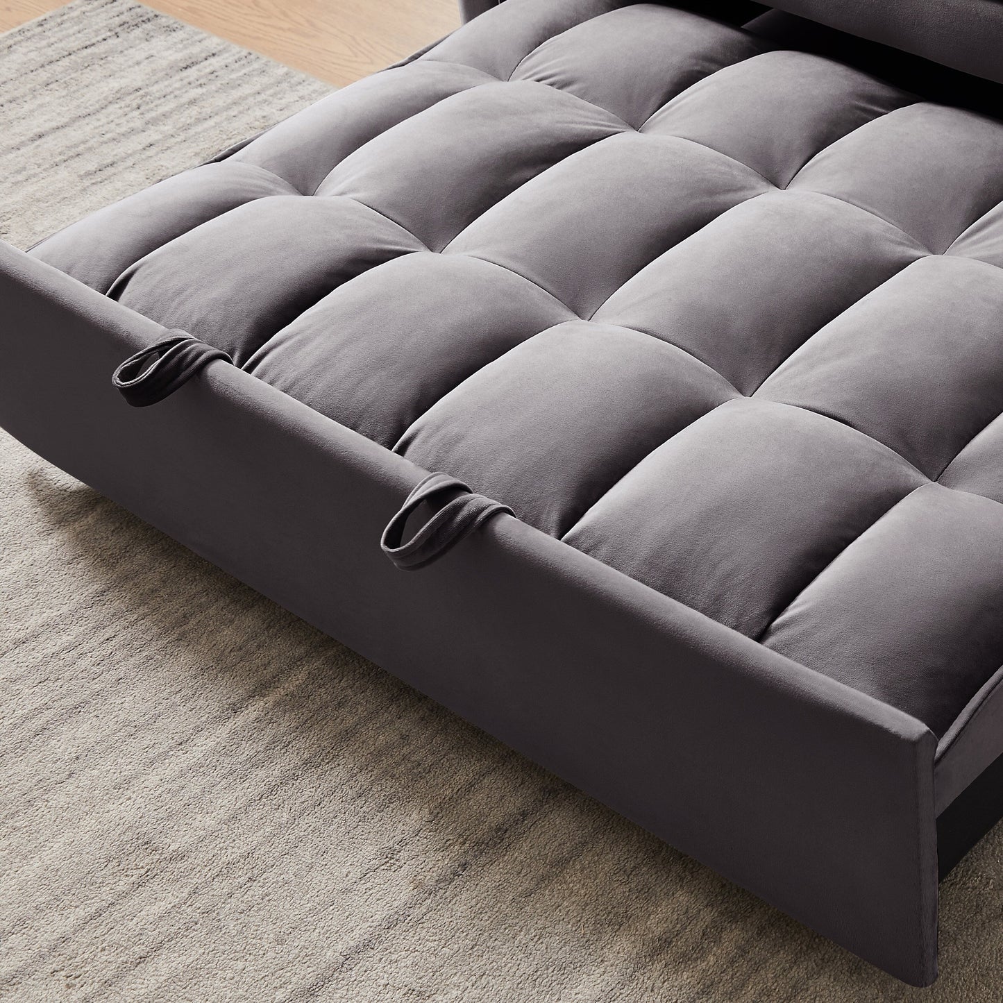 Divano letto a due posti grigio scuro con borsa portaoggetti