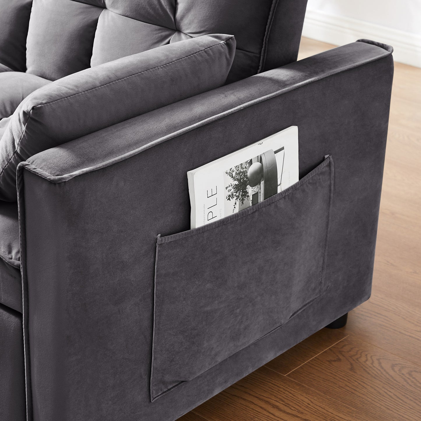 Divano letto a due posti grigio scuro con borsa portaoggetti