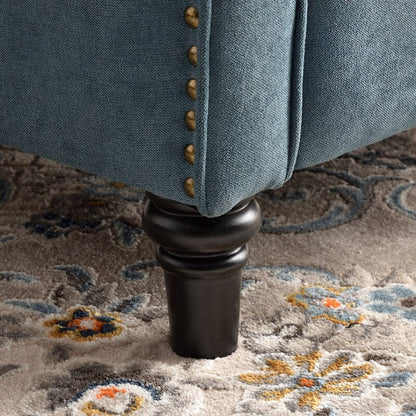 Poltrona reclinabile con schienale imbottito e gambe in legno