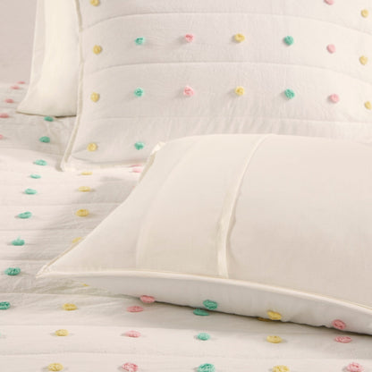 Set trapunta in cotone jacquard con pompon Ensley di Intelligent Design Kids e cuscini