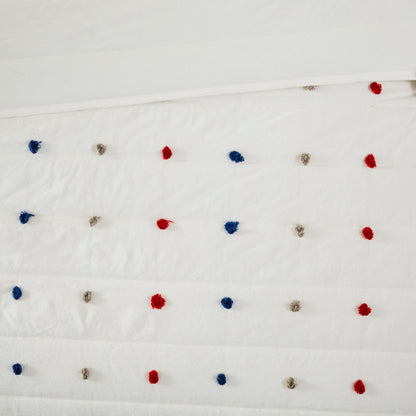 Set trapunta in cotone jacquard con pompon Ensley di Intelligent Design Kids e cuscini