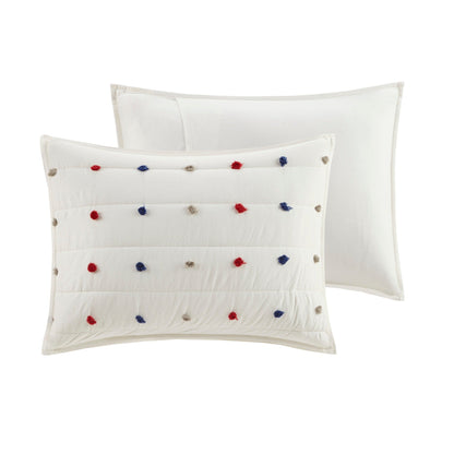 Set trapunta in cotone jacquard con pompon Ensley di Intelligent Design Kids e cuscini