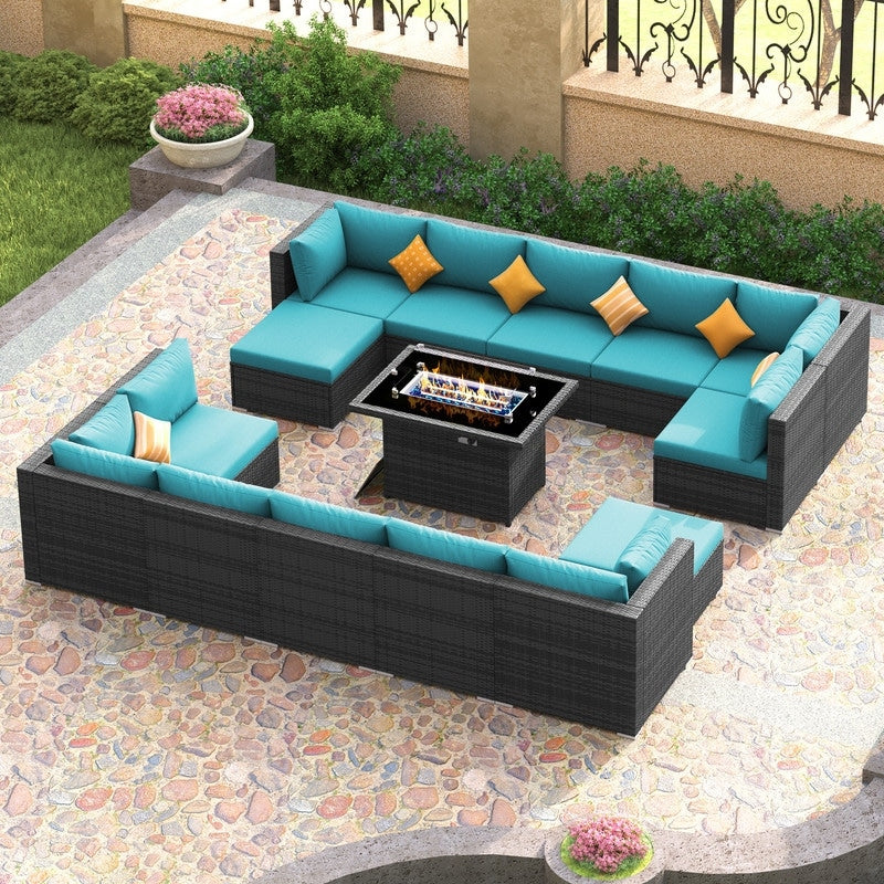 Set di divani componibili per esterni FINCATI in vimini grigio con tavolo e braciere