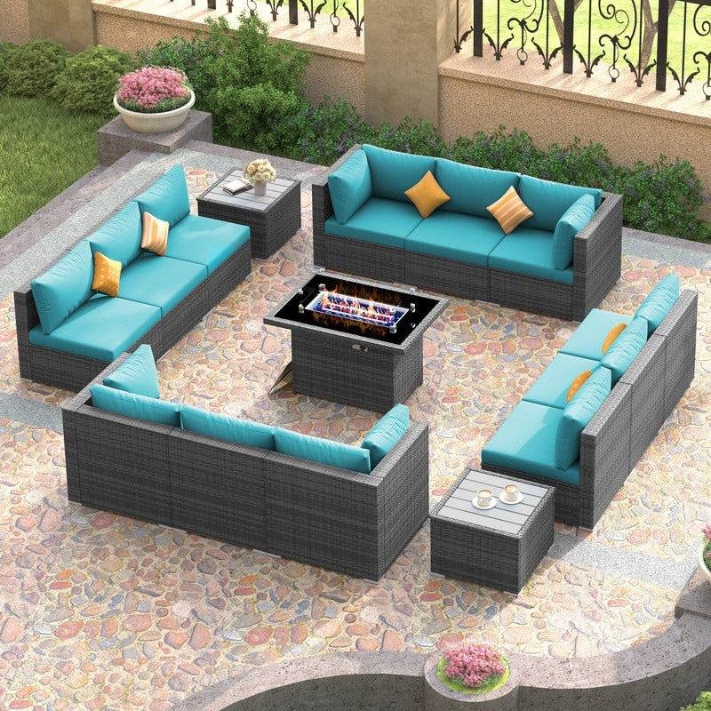 Set di divani componibili per esterni FINCATI in vimini grigio con tavolo e braciere