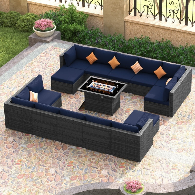 Set di divani componibili per esterni FINCATI in vimini grigio con tavolo e braciere