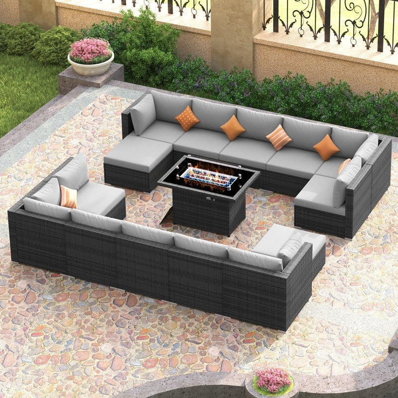 Set di divani componibili per esterni FINCATI in vimini grigio con tavolo e braciere