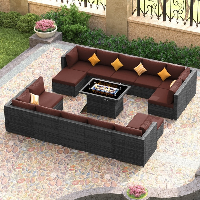 Set di divani componibili per esterni FINCATI in vimini grigio con tavolo e braciere