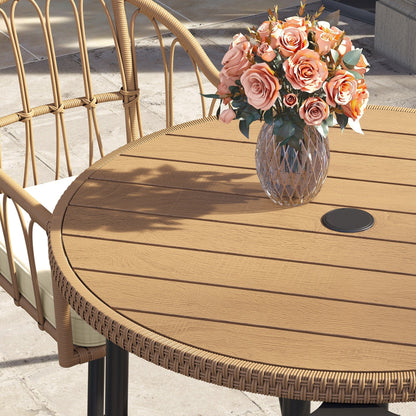 Set da pranzo per esterni Moasis da 5 pezzi in rattan, tavolo con sedie in vimini e foro per ombrellone