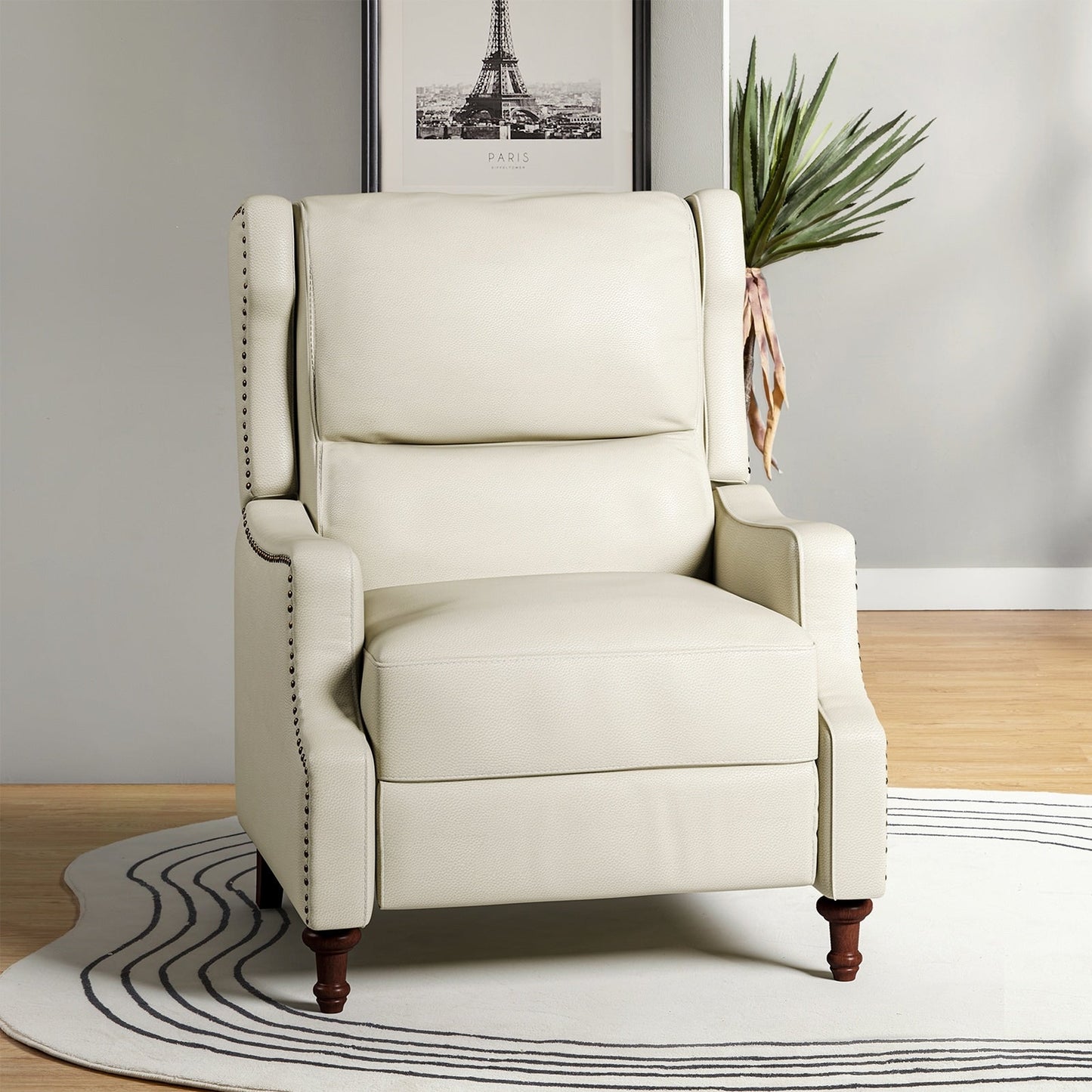 Poltrona reclinabile Florens in vera pelle con finiture a borchie di HULALA HOME