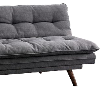 Divano futon, rivestito in tessuto grigio, capitonné, struttura in legno massello
