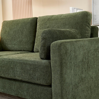 Divano a due posti in ciniglia verde con cuscini e cuscini per lo schienale