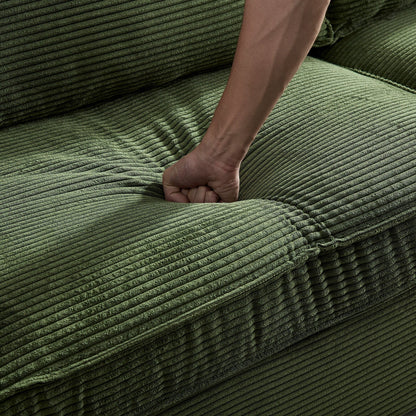 Divano a 3 posti in velluto a coste verde con portabicchieri e contenitore