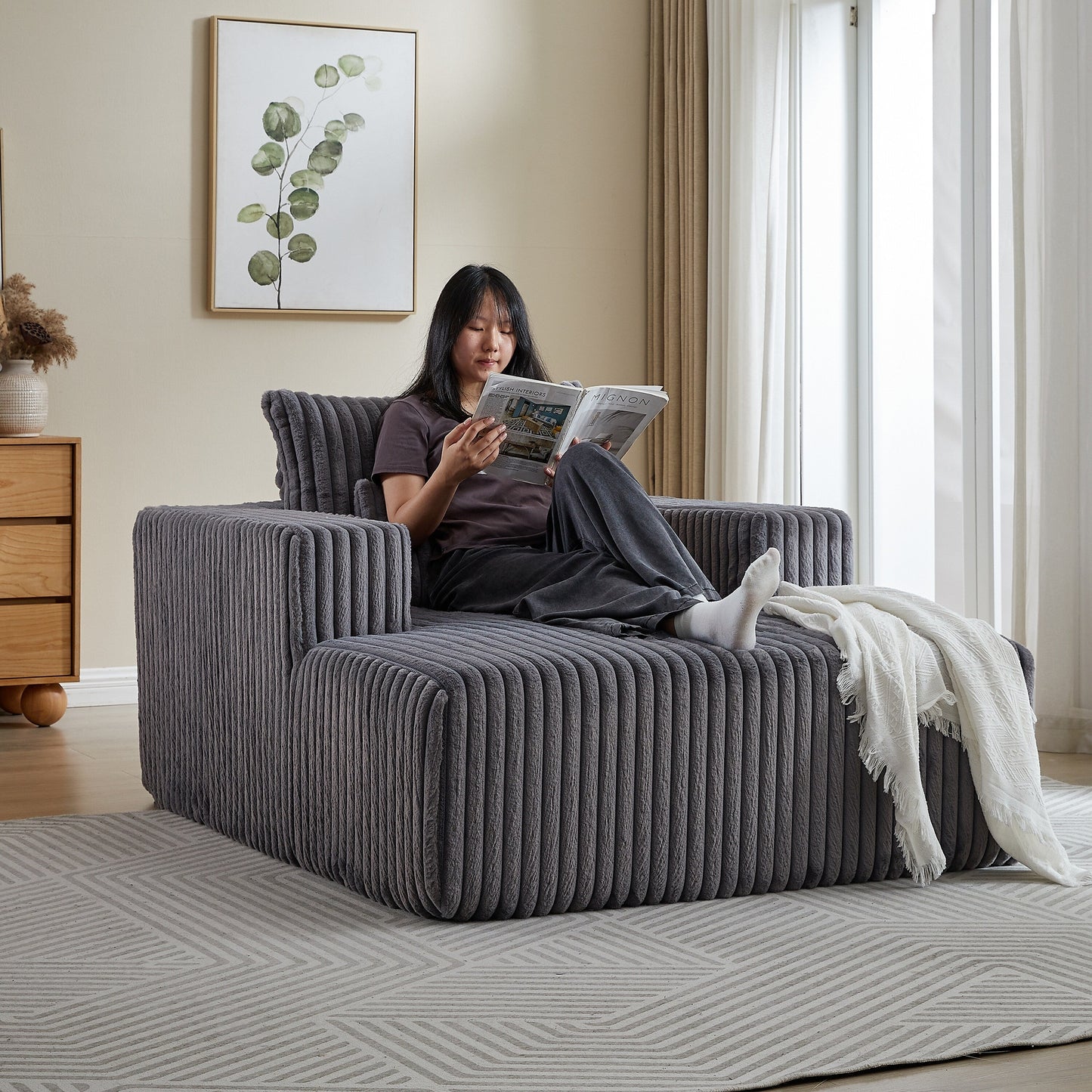 Poltrona in velluto a coste grigio con 2 cuscini