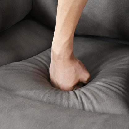 Poltrona reclinabile elettrica in tessuto grigio per anziani, con telecomando, cuscino imbottito, tasca laterale e struttura resistente