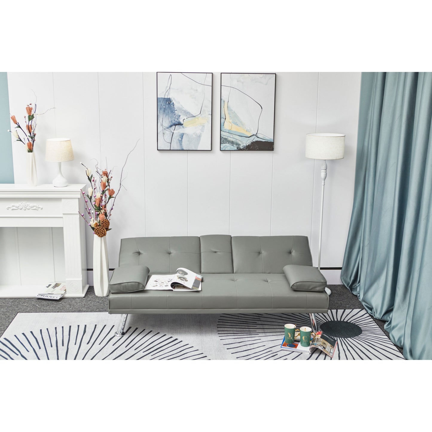 Divano letto a due posti in similpelle grigia con portabicchieri