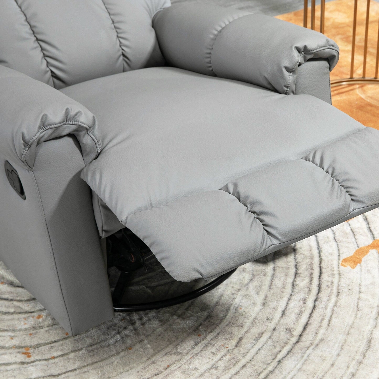 Poltrona reclinabile a dondolo in pelle grigia con rotazione a 360°, comfort imbottito, poggiapiedi e funzione di reclinazione manuale