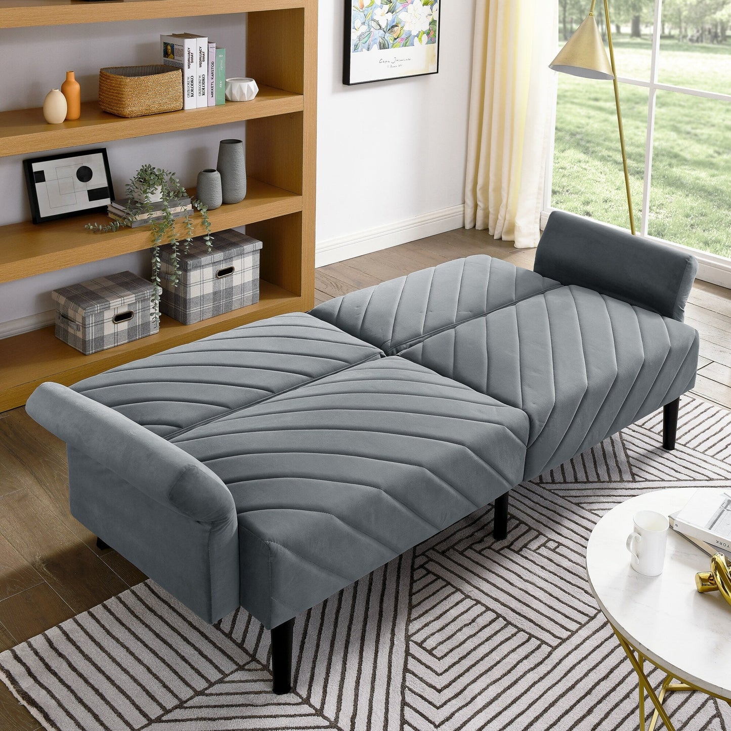 Divano letto futon convertibile in velluto grigio trapuntato