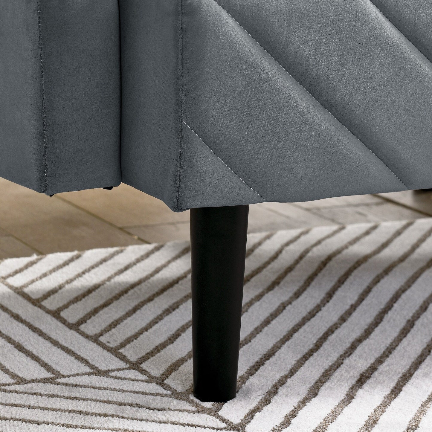 Divano letto futon convertibile in velluto grigio trapuntato