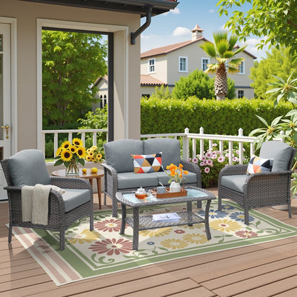 Set di divani da conversazione per esterni in vimini HOOOWOOO da 4 pezzi con tavolino in vetro