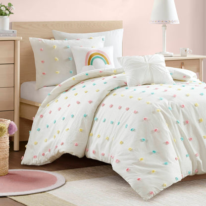 Set trapunta in cotone jacquard con pompon Ensley di Intelligent Design Kids e cuscini