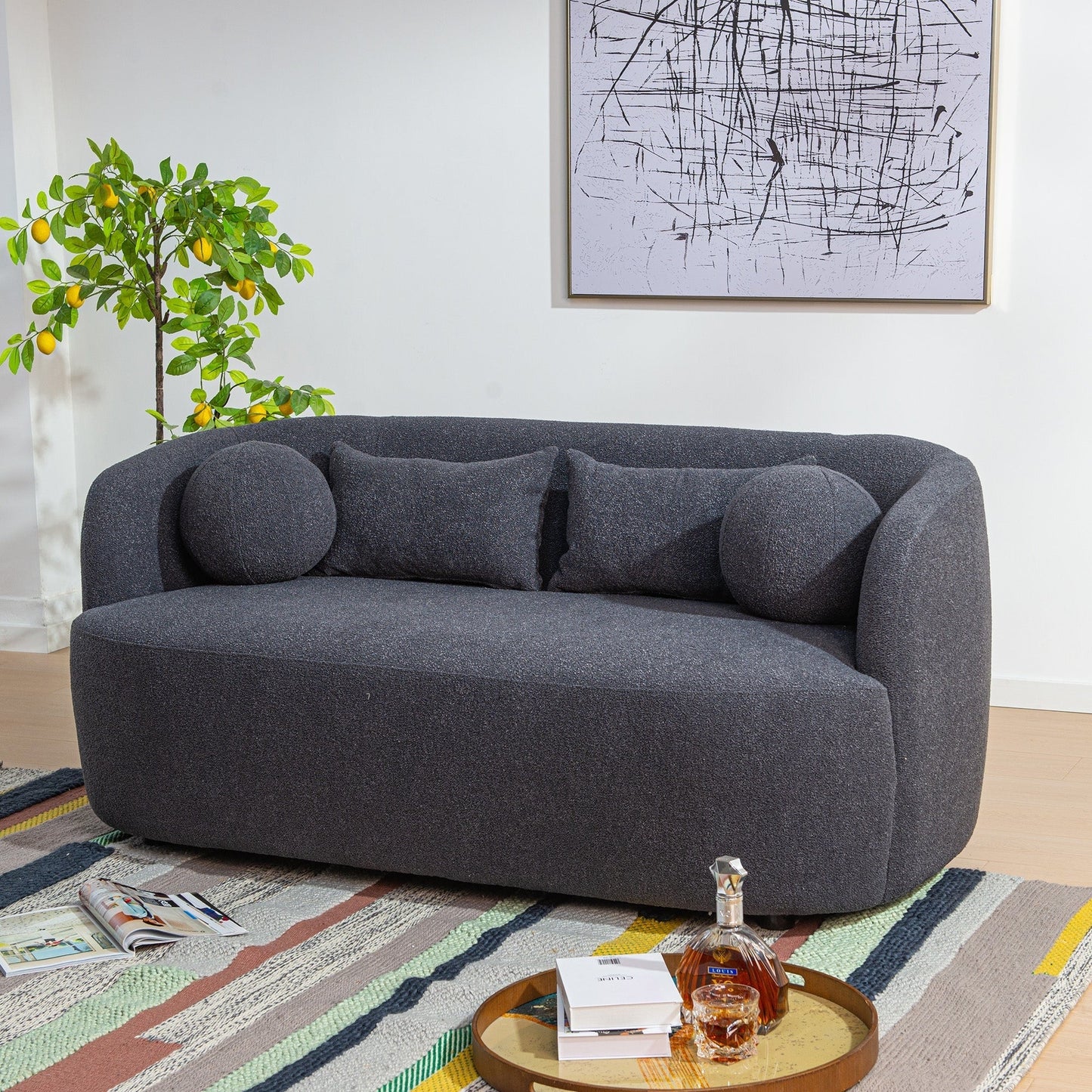 Divano a due posti imbottito in tessuto Boucle KINWELL con cuscini