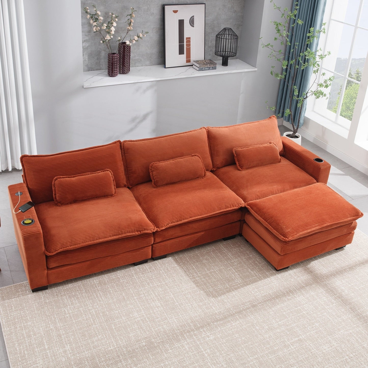 Divano a forma di L con porta USB e portabicchieri