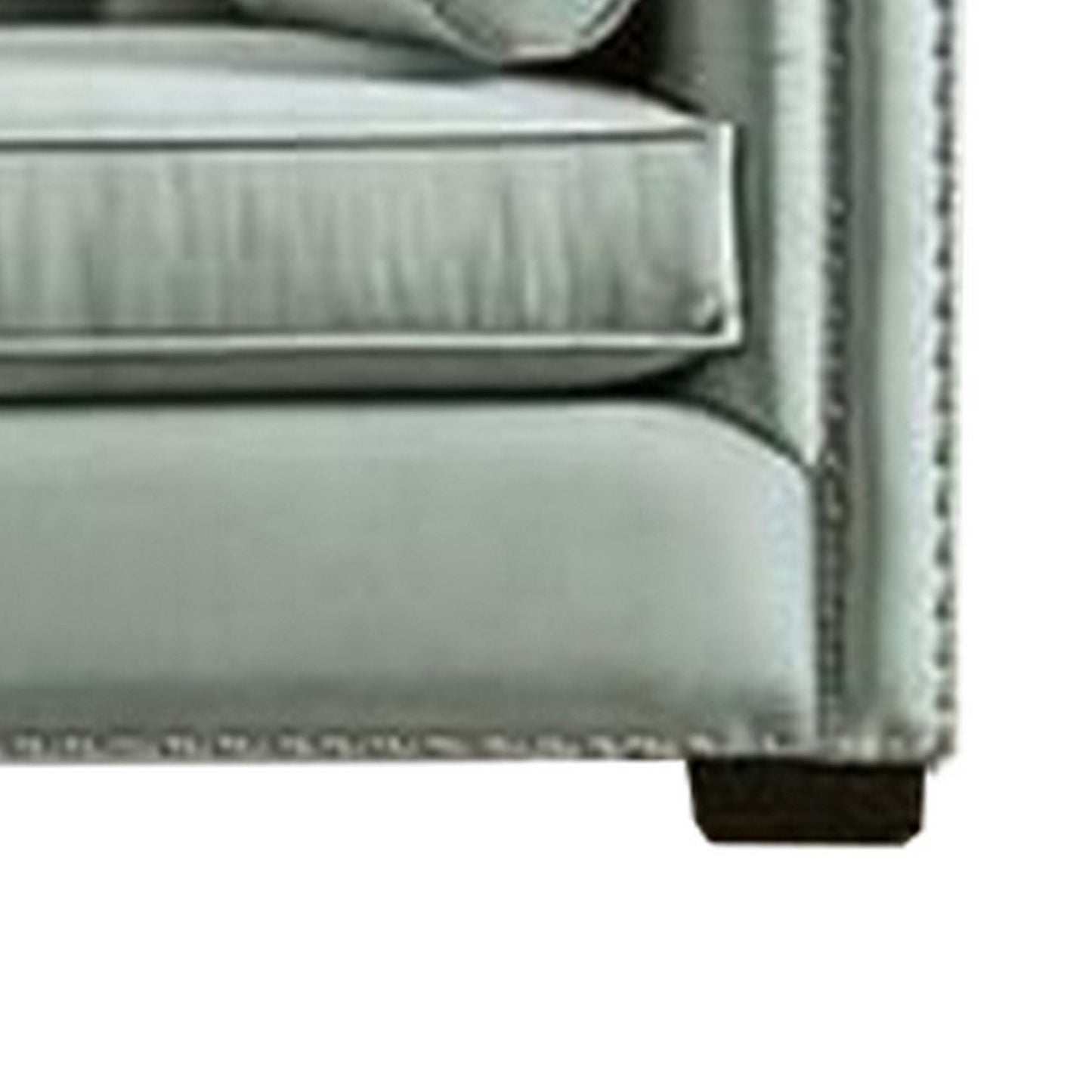 Divano Leone, trapuntato blu acqua, 2 cuscini a rullo, borchie, 93 pollici