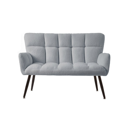 Divano a due posti Teddy azzurro 52 con schienali trapuntati e struttura in legno massello per il soggiorno.