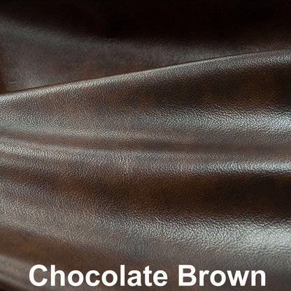 Divano letto Vernon imbottito in pelle pieno fiore con finiture a borchie