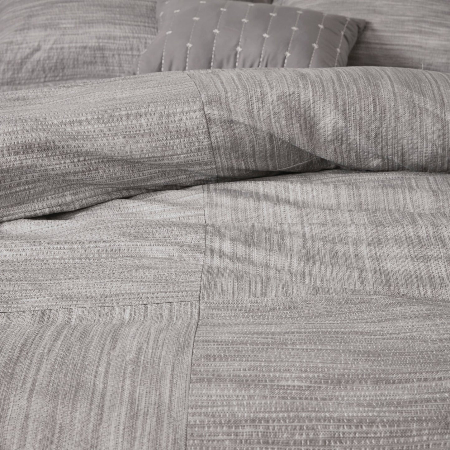 Set copripiumino in seersucker stampato Madison Park Clayton da 7 pezzi