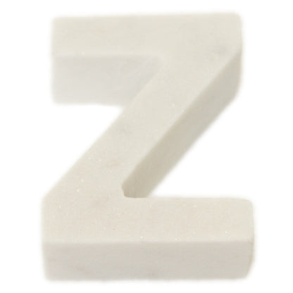 Lettera Helvetica in marmo bianco